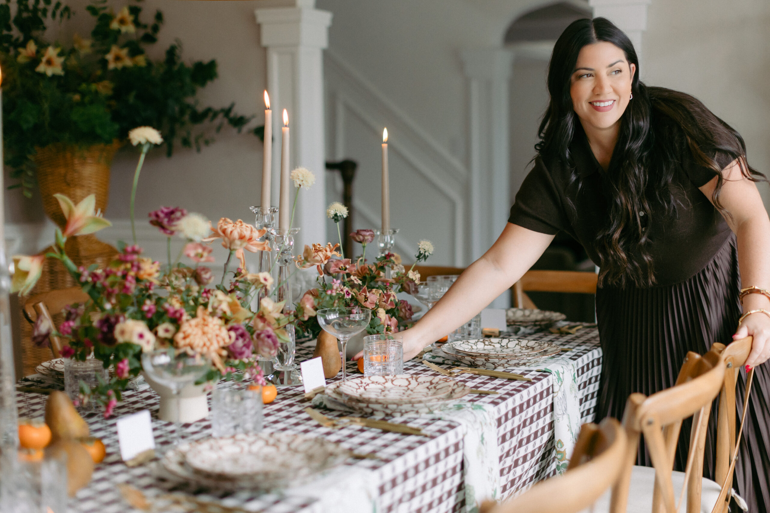 decorating for Thanksgiving with brown set and pleated skirt