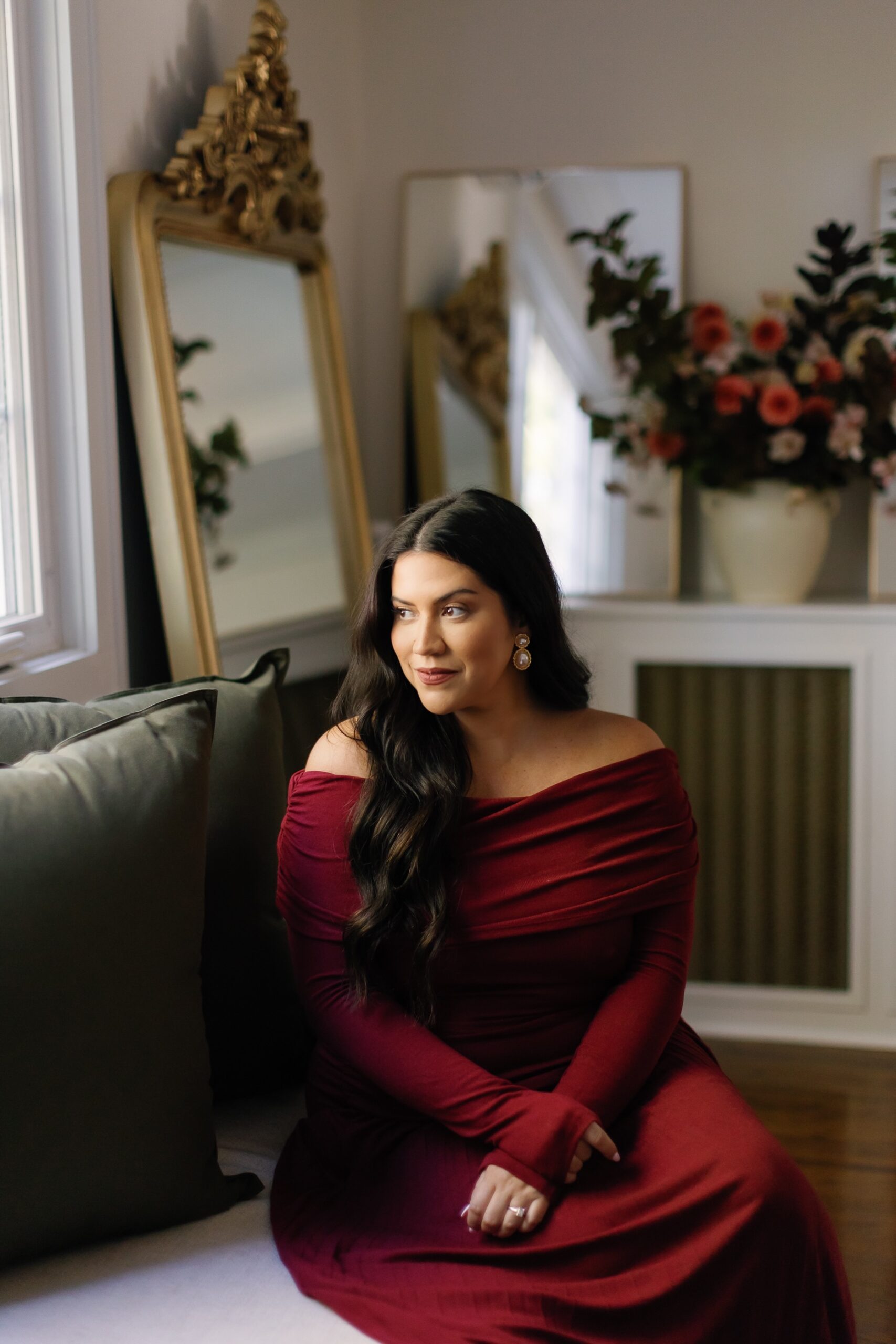 Karina wearing burgundy holiday outfits